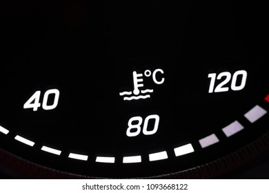 Car temperature coolant meter close-up. Temprature warning control