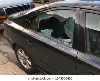 Car Thief Broken Window On A Car In The Rear Passenger Side Of The Vehicle 