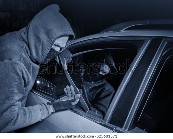 Car thief looking\
to open a locked vehicle