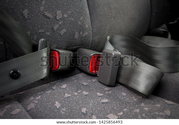 car three-point safety belt, buttoned, the concept\
of road safety, life and health of the driver and passengers,\
compliance with traffic\
rules