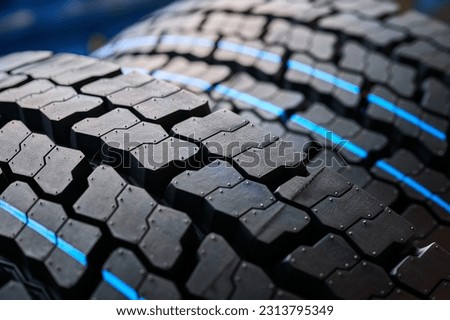 Car tire with blue markings before vulcanization process