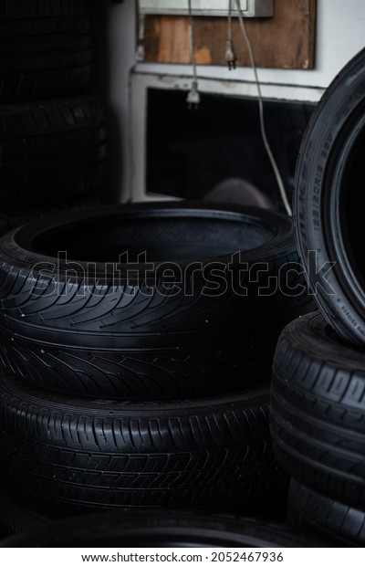 Car tire\
chang and check working in garage new\
tire