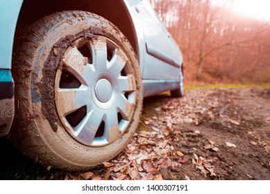 Car Tire Covered In Mud