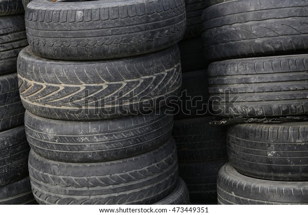 Car tire at dump
place