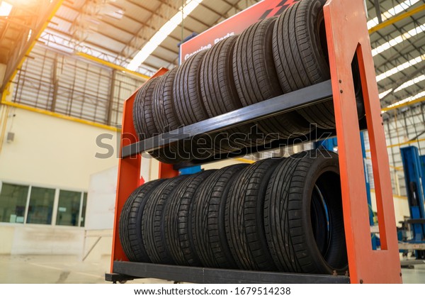 Car tire in shop,Car tires for sale at a tire
store,Car tires service.