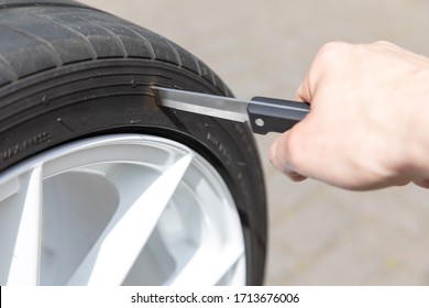 Car Tire Smash With Knife Stuck In Mature