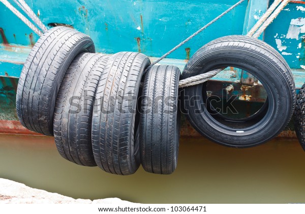 Car tire tied for\
protect bumping on boat