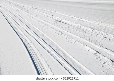 Car Tire Track In Snow