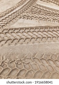 Car Tire Tracks In The Sand, No Person