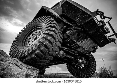 Car tires concept on off road. Shock absorber. Travel and racing concept for 4x4 drive off road vehicle - Powered by Shutterstock