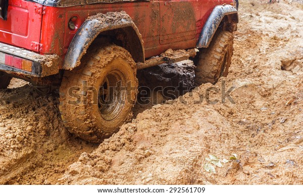 car tires in dirt\
road