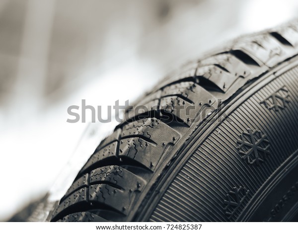 car tires displayed for sale, depicted in an\
abstract fashion