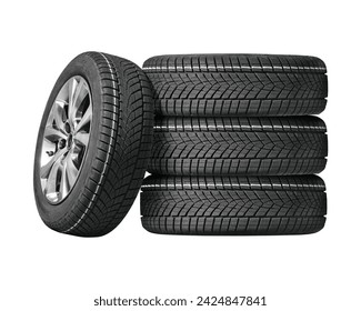 Car tires with a great profile in the car repair shop. Set of summer or winter tyres in front of white fond. On transparent PNG background.