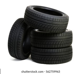 Car tires isolated on white - Shutterstock ID 562759963