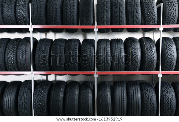 Car tires on rack in auto\
store