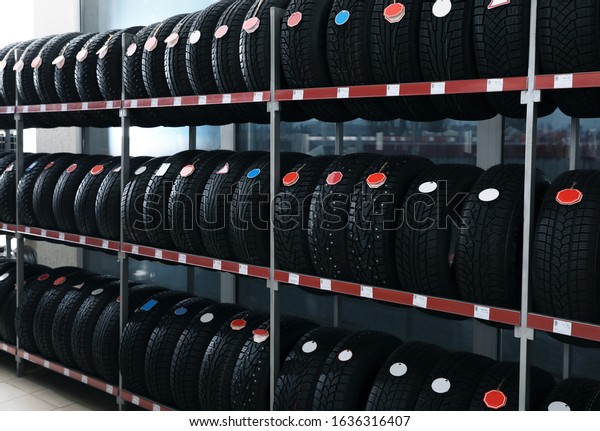 Car tires on rack in auto\
store