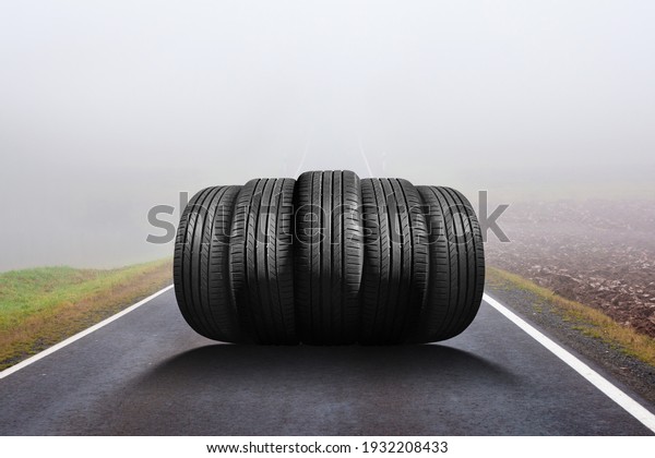 car
tires on the road in the fog - time for summer
tires