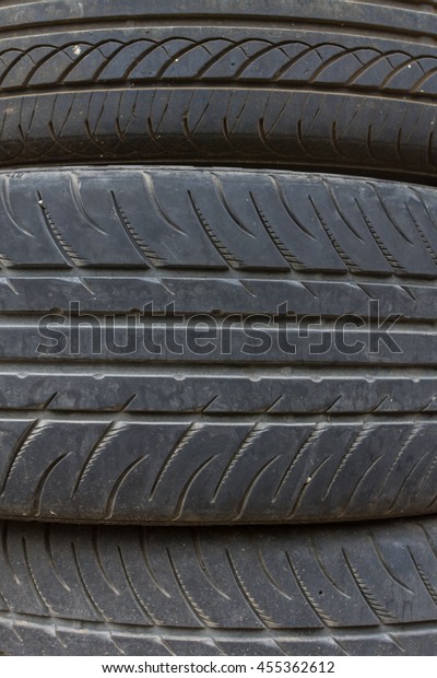 Car tires stack up used deterioration expired\
and dangerous