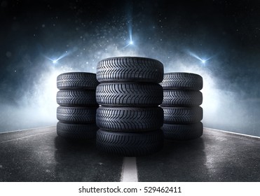 Car tires standing on a road