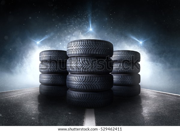 Car tires standing on a\
road