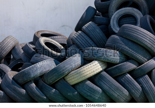 Car tires at warehouse,\
close up.