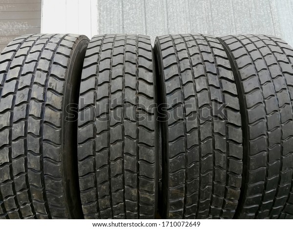 Car tires at warehouse\
in tire store.