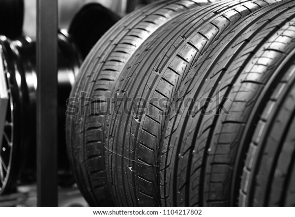 Car\
tires at warehouse in tire store.black and white\
tone