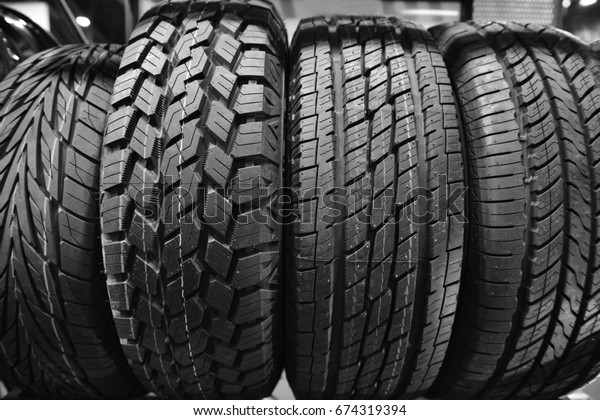 Car\
tires at warehouse in tire store.black and white\
tone