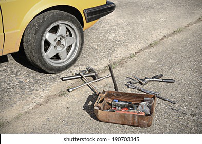 Car Tool Kit On The Asphalt