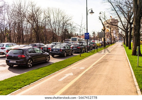 Car traffic in downtown area of Bucharest.\
Car pollution, traffic jam in the morning and evening in the\
capital city of Bucharest, Romania,\
2020