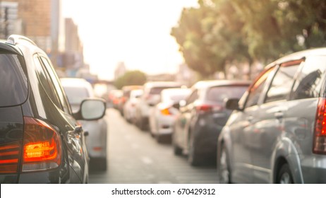 Car and traffic jam concept - Blurred row of car on evening treaffic jam hour in bangkok thailad and copyspace, Use for city and car traffic problem content