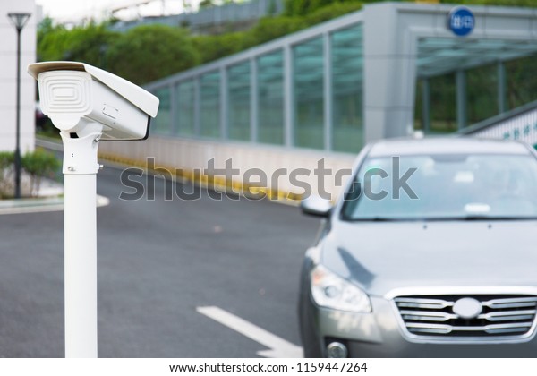Car\
traffic monitoring technology, at the exit of the parking lot, a\
camera captures the driving situation of the\
car
