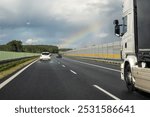 Car traffic on highway on rainy day. The truck on the asphalt road