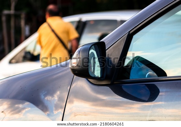 Car traffic at rush hour in\
downtown area of the city. Car pollution, traffic jam in the\
morning and evening in the capital city of Bucharest, Romania,\
2021