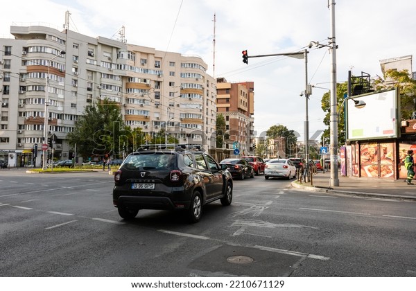 Car traffic at rush hour. Car pollution,\
traffic jam in Bucharest, Romania,\
2022
