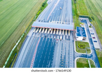 Car Traffic Transportation On Multiple Lanes Highway Road And Toll Collection Gate, Drone Aerial Top View. Commuter Transport, City Life Concept.A2 Poland Lodz