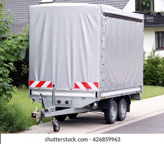 Car Trailer With High Build And Gray Tarp