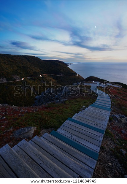 Car trails along the\
Cabot Trail as seen from the Skyline Trail in Cape Breton National\
Park, NS, Canada