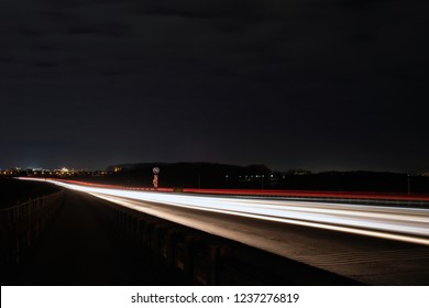 car trails in night