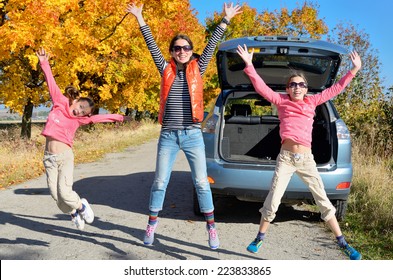 Car Trip On Autumn Family Vacation, Happy Mother And Kids Travel And Have Fun, Car Insurance Concept 