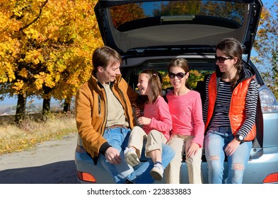 Car Trip On Autumn Family Vacation, Happy Parents And Kids Travel And Have Fun, Car Insurance Concept 