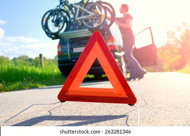 Car Trouble - Woman Is Checking The Roof Box