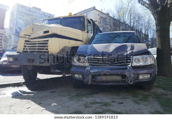 car and truck big cars crashed in tree, accident\
on the road in the city	