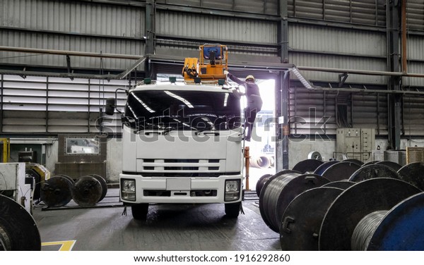 Car truck with loader to pick up steel wire scrap in\
factory 