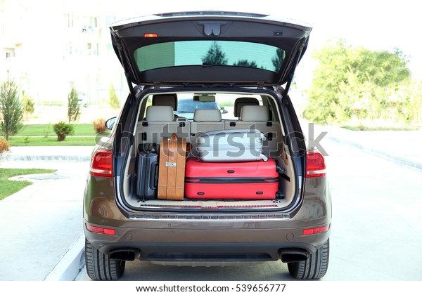 Car trunk with\
baggage