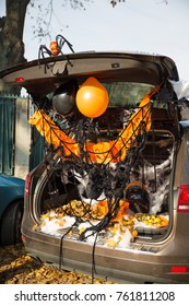 A Car Trunk Decorated For Halloween Trick Or Treat Game