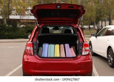 Car Trunk Full Of Shopping Bags Outdoors