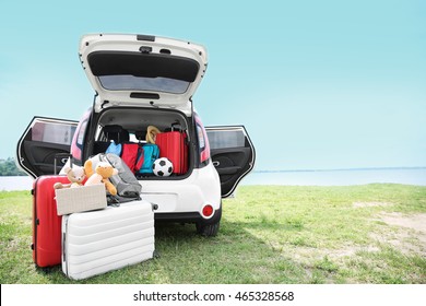 Car Trunk With Luggage. Travel Concept