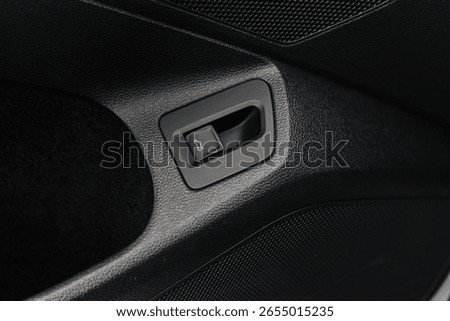 Car Trunk Release Button on Interior Door Panel