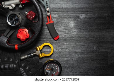 Car tuning equipment and accessories on the black table flat lay background. - Shutterstock ID 2057772059
